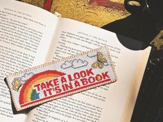 🌈🦋Take a look, it's in a book! Keep track of where you're at on your reading adventure with this nostalgic cross-stitch bookmark pattern! The (butterfly in the) sky is the limit, as you can use the suggested DMC colors or customize them to create the perfect cozy bookmark for you or your loved one's reading journey 📖 Cross stitch bookmark pattern PDF download Pattern size: 105x37 stitches Fabric count: 14 ct  Finished size: 7.5 x 2.6" Total DMC colors: 10 *PATTERN DOWNLOAD INFO --- After your Cross Stitch Patterns Books, Twin Peaks Cross Stitch, Cross Stitch Bookmarks Free Pattern, Fun Cross Stitch Patterns, Cross Stitch Bookmark Patterns Free Charts, Crosstitch Bookmark, Nerdy Cross Stitch Patterns, Cross Stitch Bookmark Patterns Free, Cross Stitch Gift Ideas