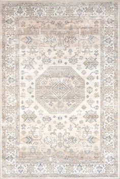 a beige and blue rug with an intricate design