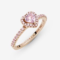 Add a sophisticated touch to your look with the Sparkling Elevated Heart Ring. The ring draws inspiration from the classic Pandora Timeless collection. Hand-finished in 14k rose gold unique metal blend, this piece features a pink heart-shaped central, elevated stone. Clear cubic zirconia create the halo and decorate half of the ring band, with the Pandora logo inside the shank. Stack this ring with hand-finished styles in sterling silver for a statement mixed metal look. - Pandora Sparkling Elev Rose Gold Pandora Ring, Gold Ring With Pink Stone, Gold And Pink Ring, Pink Pandora Ring, Elegant Pink Gold Jewelry With Center Stone, Classic Rose Gold Jewelry With Accent Stones, Luxury Rose Gold Heart Ring For Valentine's Day, Elegant Pink Heart Ring With Center Stone, Pink Gold Fine Jewelry Rings For Valentine's Day