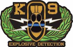 the k9 explosive detector logo is shown in black and gold with an image of a dog's paw on it