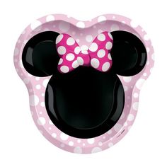 a minnie mouse shaped bowl with a pink bow on it's head and polka dots