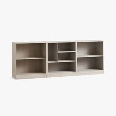 an empty bookcase against a white background