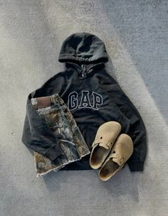 camo jorts, clog birks, fall outfits, thrifted, camo jort fits Mens Outfit Layout, Camo Crewneck Outfit, Camo Jorts Outfit, Camo Crocs Outfit, Camo Jorts Outfit Idea, Camo Outfits Mens, Camo Birkenstock, Jort Fits, Camo Outfit Ideas