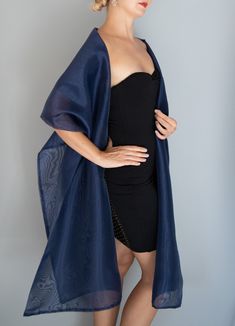 A very elegant large organza shawl for your wedding party or evening dress. Made of luxury organza. The wrap has 2 arm holes to keep the wrap in place.  Color: navy blue  Size : 220 cm x 50cm  You can use it as a wrap, shawl or stola. WE have matching bags in our Etsy Shop! WE accept credit cards! Navy Blue Shawl, Formal Wrap, Cold Wedding, Bridesmaid Wrap, Formal Ideas, Dress Shawl, Wedding Shrug