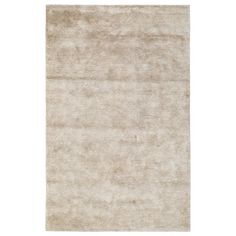 a beige rug on a white background with no one in the room to see it