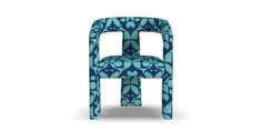 an upholstered chair with blue and green designs