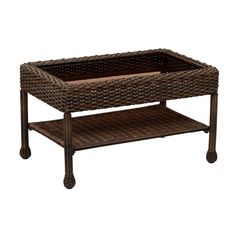 a wicker coffee table with wheels on the bottom and an open tray underneath it