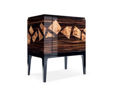 a wooden cabinet with geometric designs on it