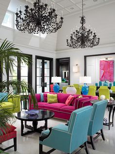 a living room filled with lots of colorful furniture