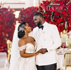 a bride and groom standing next to each other