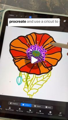 someone is drawing an orange flower on the screen