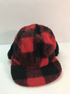 Vintage 100% Wool Plaid Red And Black Hunting Hat Cap With Ear Flaps Small. This is a nice vintage wool hat. There is no size listed but it is appears to be a size small. In good overall condition. See pictures for more info. Red Winter Baseball Cap For Outdoor, Red Vintage Hats, Vintage Red Outdoor Hat, Red Vintage Outdoor Hat, Red Vintage Winter Hat, Vintage Red Flat Cap, Red Winter Baseball Cap, Retro Red Flat Cap, Red Baseball Cap For Winter