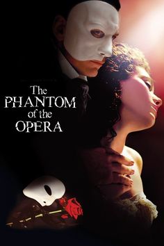 the phantom of the opera poster with an image of a man and woman in masks