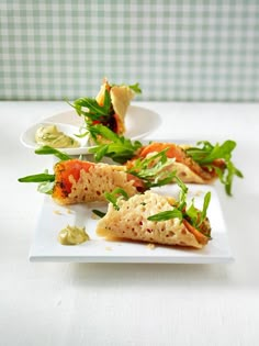 a white plate topped with food on top of a table