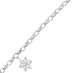 She'll adore the wintry inspiration of this darling diamond charm bracelet. Crafted in sterling silver, this cute choice features a shimmering diamond-touched snowflake dangle. Alternating polished and beaded oval-shaped links complete the look. Radiant with 1/10 ct. t.w. of diamonds and a brilliant buffed luster, this 7.5-inch bracelet secures with a lobster claw clasp. Peoples Jewellers, Diamond Charm, Diamond Bracelets, Engraved Rings, Diamond Stone, Bracelet Designs, Silver Bracelets, Lobster Claw, Link Bracelets