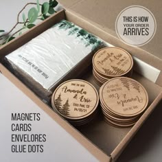 four wooden coasters in a box with the words magnets cards envelopes glue dots