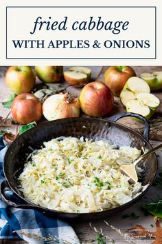 fried cabbage with apples and onions in a skillet