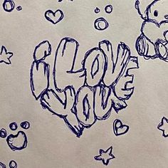 a drawing of the word love with hearts and stars