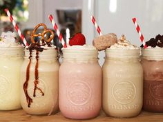 three mason jars filled with ice cream and cookies