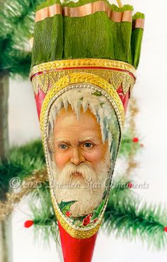 a christmas ornament with a man's head on it