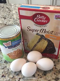 eggs, cake mix and butter sit on a counter next to a can of mayonnaise