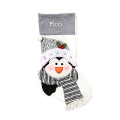 a christmas stocking with a snowman wearing a hat and scarf