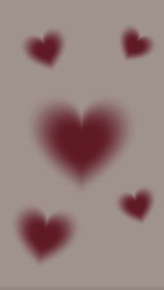 several red hearts are shown in the shape of a heart on a gray background with shadows