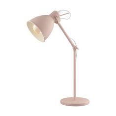 a pink desk lamp on a white background