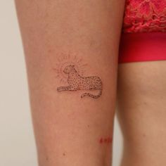 a woman with a tattoo on her arm