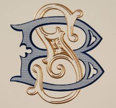 the letter e is made up of gold and blue lines with swirls on it