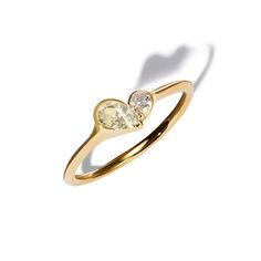 === A modern take on the Toi-et-Moi setting. Two pear-shaped diamonds in an asymmetrical heart shape, set on a solid 18kt gold knife-edge band. Celebrating the unique nature of your love Stone: Natural Diamond (0.3ct) Material: 18kt Recycled Yellow Gold Made in: Japan Resizable: YesUnsure of your size? Find your size at home Customization: Custom engraving and color variations available.inquire here === The New Shape of Love. A modern Toi-et-Moi aesthetic celebrating love's diversity. Crafted in Two Diamond Ring, Shape Of Love, Gold Knife, Diamond Rings Design, Love Shape, Gold Ring Designs, Unique Nature, Diamond Cocktail Rings, Pear Shaped Diamond