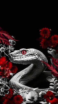 a snake with red eyes surrounded by flowers