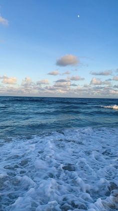 the ocean with waves coming in to shore