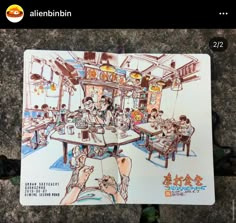 a drawing of people sitting at a table in a restaurant with chinese writing on it