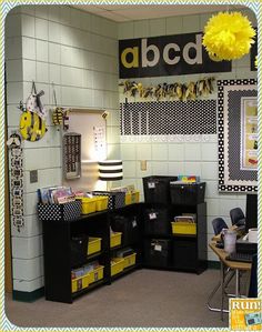 an office decorated with yellow and black boxes