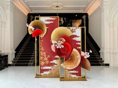 an entrance with red and gold decorations on it