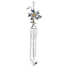 a wind chime with a bird on it's back and an object hanging from the side