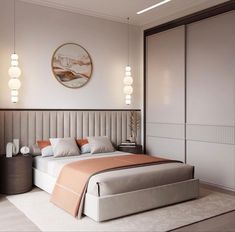 a bedroom with a large bed and white walls