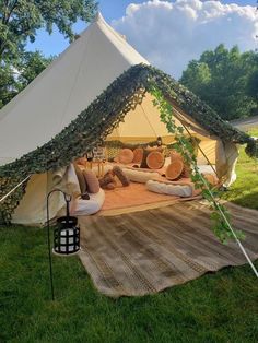 a tent that has some pillows on it