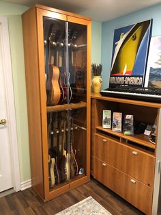 a room with guitars on display in it