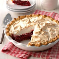 a pie sitting on top of a white table