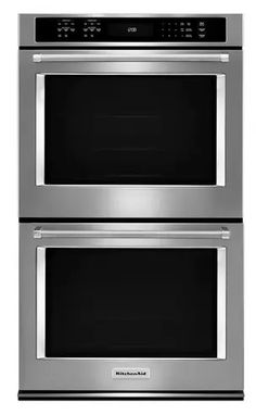 two stainless steel ovens side by side