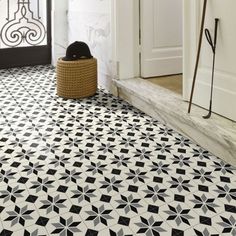 a black and white floor with a basket on it