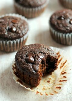 chocolate cupcakes with one cut in half