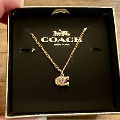 Brand New Without Tags And Absolutely Gorgeous Describes This Authentic Coach Dainty Pink Crystal C Pendant Beautifully Displayed On This Genuine 18k/.925 Necklace. Necklace Measures 18” In Length Lobster Claw Clasp. Please Note That The Coach Gift Box Is Used For Pictures And Display And Is Not Included! Black Velvet Drawstring Dust Bag Will Be Provided! Gold Coach Necklace, Coach Round Jewelry For Anniversary, Pink Necklaces For Birthday Gift, Coach Gold Jewelry For Anniversary, Coach Rose Gold Jewelry For Gifts, Gold Coach Jewelry For Anniversary, Coach Sterling Silver Jewelry As A Gift, Elegant Coach Sterling Silver Jewelry, Coach Elegant Sterling Silver Jewelry