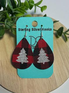 Christmas Earrings, Red Plaid Christmas Tree Cutout Teardrops. These lightweight earrings are a perfect accessory to your Christmas Holiday outfits. Made of faux leather with Sterling Silver hooks are suitable for sensitive earrings. *color and pattern may vary due to nature of leather and lighting Holiday Faux Leather Earrings, Faux Leather Christmas Earrings, Christmas Leather Earrings, Red Plaid Christmas Tree, Christmas Faux Leather Earrings, Tree Cutout, Red Plaid Christmas, Leather Christmas, Cricut Christmas Ideas