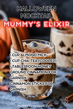 two glasses filled with drinks and cinnamon sticks on top of each glass, next to pumpkins