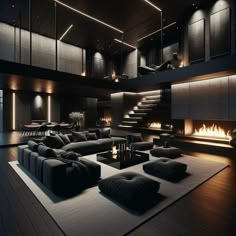 a living room with black furniture and a fire place in the center is lit by recessed lights