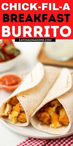 chicken - filled breakfast burritos on a white plate with red and white checkered napkin