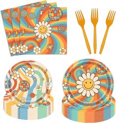 an assortment of colorful plates, forks and napkins